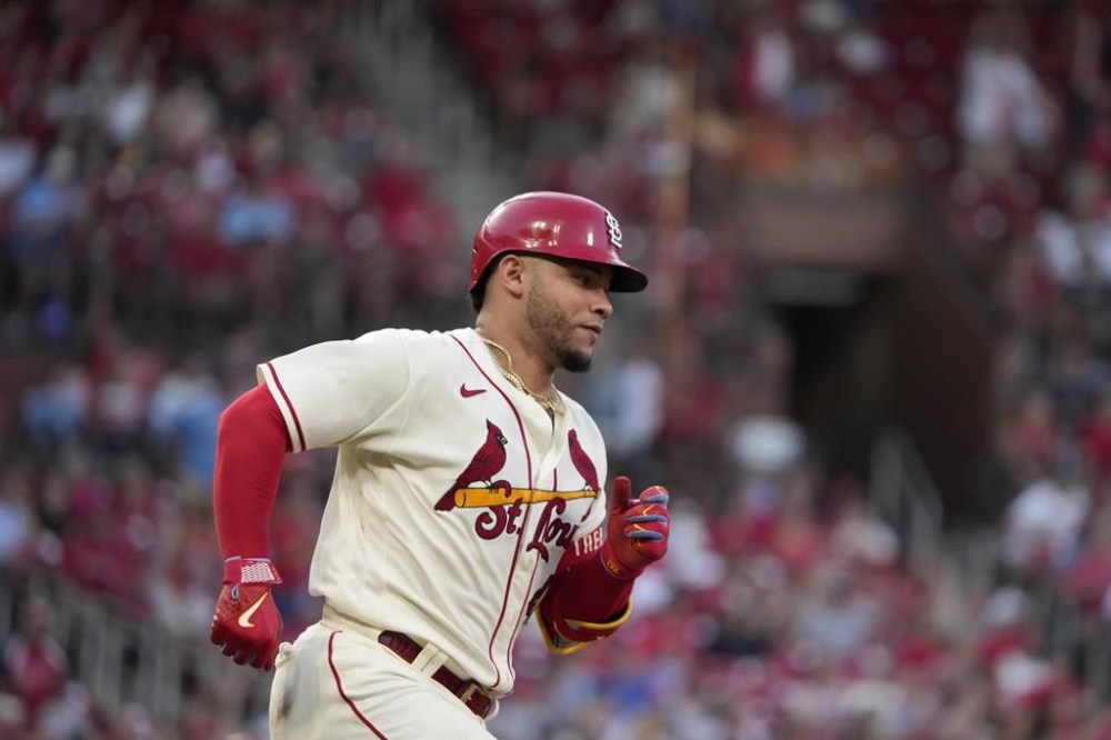 St. Louis Cardinals' Willson Contreras rounds first on his way to a two-run double during the fifth inning of a baseball game against the Colorado Rockies Saturday, Aug. 5, 2023, in St. Louis. (AP Photo/Jeff Roberson)
