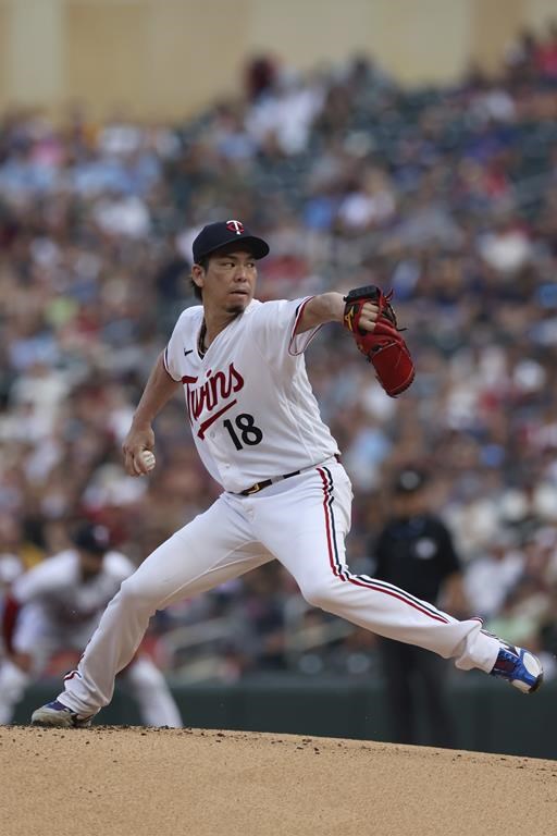 Minnesota Twins pitcher Kenta Maeda throws during the first inning of a baseball game against the Arizona Diamondbacks, Saturday, Aug. 5, 2023, in Minneapolis. (AP Photo/Stacy Bengs)