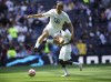 Tottenham Hotspur's Harry Kane warms up before the pre-season friendly soccer match between Tottenham and Shakhtar Donetsk, at the Tottenham Hotspur Stadium, London Sunday August 6, 2023. (Yui Mok/PA via AP)