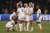 US players react following their loss to Sweden in a penalty shootout during the Women's World Cup round of 16 soccer match in Melbourne, Australia, Sunday, Aug. 6, 2023. (AP Photo/Scott Barbour)