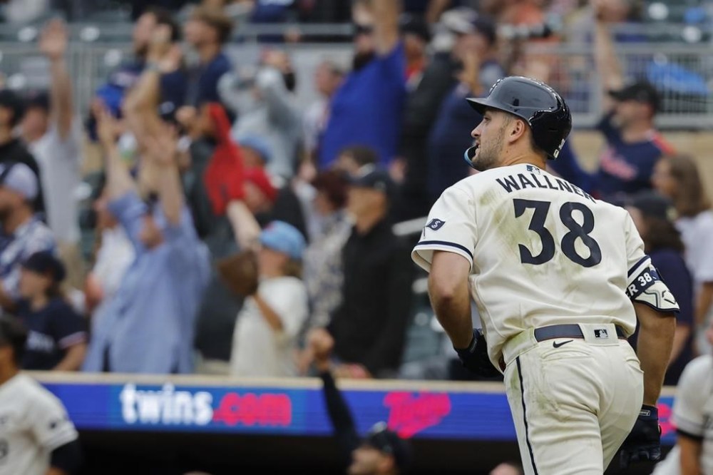 Minnesota Twins' Matt Wallner runs the bases on his two-run home run to defeat the Arizona Diamondbacks in the ninth inning of a baseball game Sunday, Aug. 6, 2023, in Minneapolis. (AP Photo/Bruce Kluckhohn)