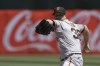 San Francisco Giants pitcher Alex Cobb throws to an Oakland Athletics batter during the first inning of a baseball game Sunday, Aug. 6, 2023, in Oakland, Calif. (AP Photo/Godofredo A. Vásquez)