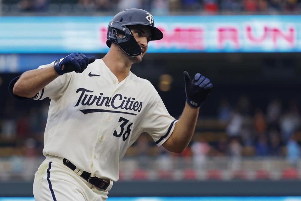 Minnesota Twins' Matt Wallner runs the bases on his two-run home run to defeat the Arizona Diamondbacks in the ninth inning of a baseball game Sunday, Aug. 6, 2023, in Minneapolis. (AP Photo/Bruce Kluckhohn)