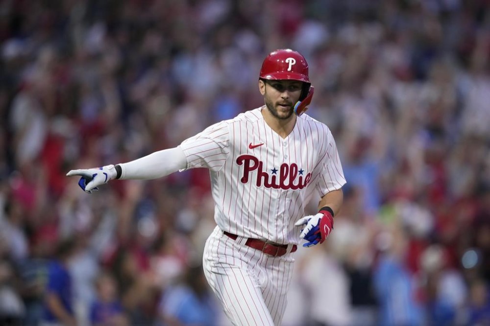Philadelphia Phillies' Trea Turner reacts after hitting a three-run home run against Kansas City Royals pitcher Angel Zerpa during the sixth inning of a baseball game, Saturday, Aug. 5, 2023, in Philadelphia. (AP Photo/Matt Slocum)