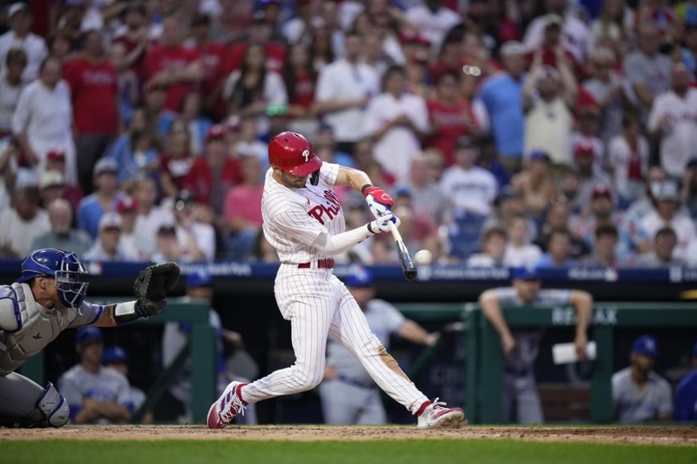 Philadelphia Phillies' Trea Turner hits a three-run home run against Kansas City Royals pitcher Angel Zerpa during the sixth inning of a baseball game, Saturday, Aug. 5, 2023, in Philadelphia. (AP Photo/Matt Slocum)