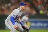 New York Mets third baseman Brett Baty waits for a pitch to the Baltimore Orioles in the sixth inning of a baseball game, Friday, Aug. 4, 2023, in Baltimore. (AP Photo/Julio Cortez)