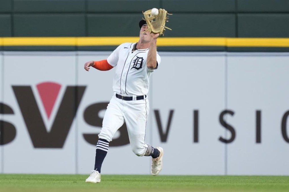 Detroit Tigers right fielder Kerry Carpenter catches the fly out hit by Minnesota Twins' Carlos Correa during the fourth inning of a baseball game, Monday, Aug. 7, 2023, in Detroit. (AP Photo/Carlos Osorio)