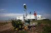 Flowers and other items placed at the intersection of the Trans Canada Highway and Highway 5 just north of Carberry as a memorial to the victims of a devastating collision involving a semi trailer and a passenger bus. (Tim Smith / The Brandon Sun files)