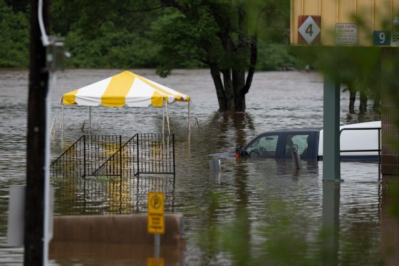 A truck is seen abandoned in floodwater following a major rain event in Halifax in 2023. (Darren Calabrese / The Canadian Press files)