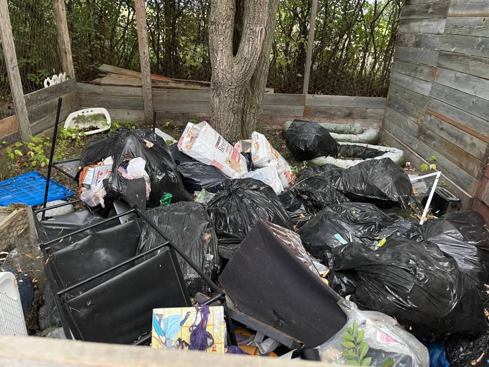 SUPPLIED
A pile of garbage was left rotting outside Kerri Stephens’s home.