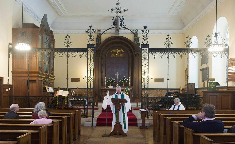 GRAHAM HUGHES/ THE CANADIAN PRESS FILES
People attend mass at St. James Anglican Church in Trois-Rivières, Que. There is speculation among those studying religious practices that there may not be any Anglicans left in Canada by 2040.