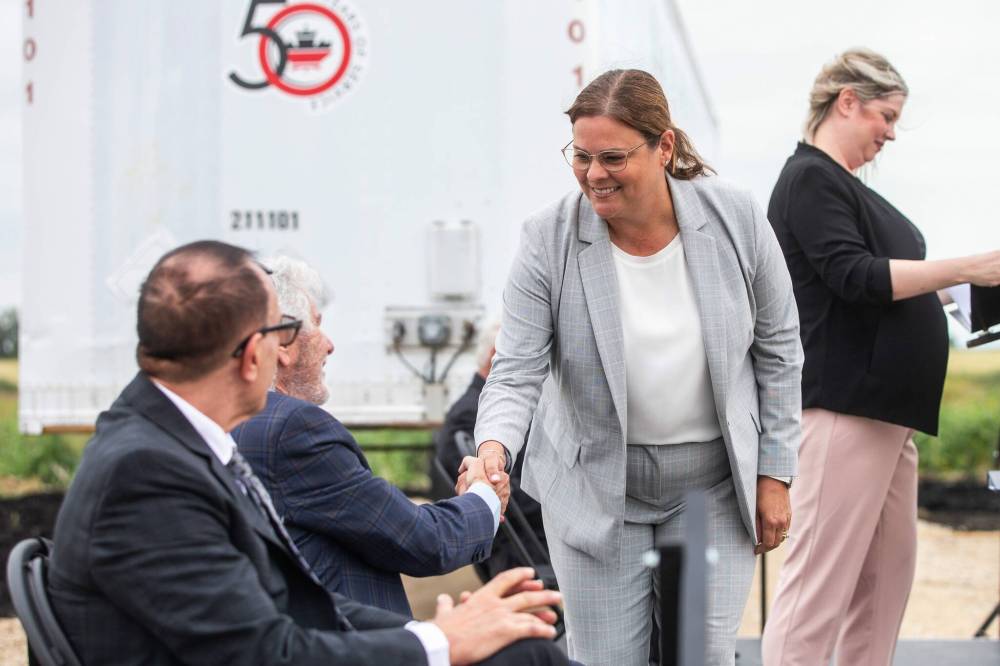 <p>MIKAELA MACKENZIE / WINNIPEG FREE PRESS</p>
<p>Premier Stefanson shakes hands with executive chairman of Fastfrate Group, Ron Tepper.</p>