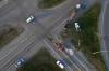 RCMP officers and tow truck operators work at the scene of a three-vehicle collision at the intersection of Highway 5 and the Trans-Canada Highway just north of Carberry on Monday evening. (Tim Smith / The Brandon Sun)