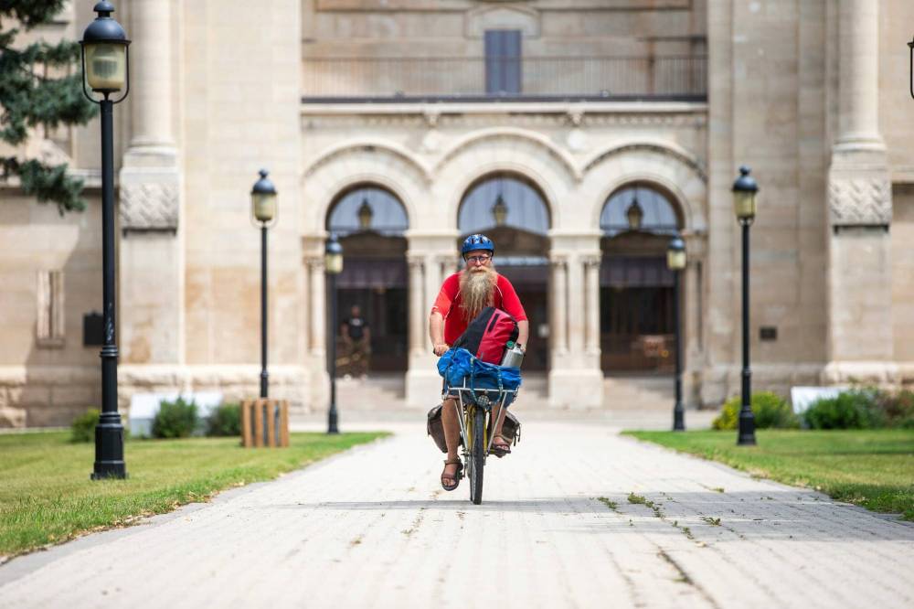 MIKAELA MACKENZIE / WINNIPEG FREE PRESS
Mic Whitty is on his eighth year of cycling around the world visiting every cemetery where a Commonwealth World War One or Two casualty is buried.
