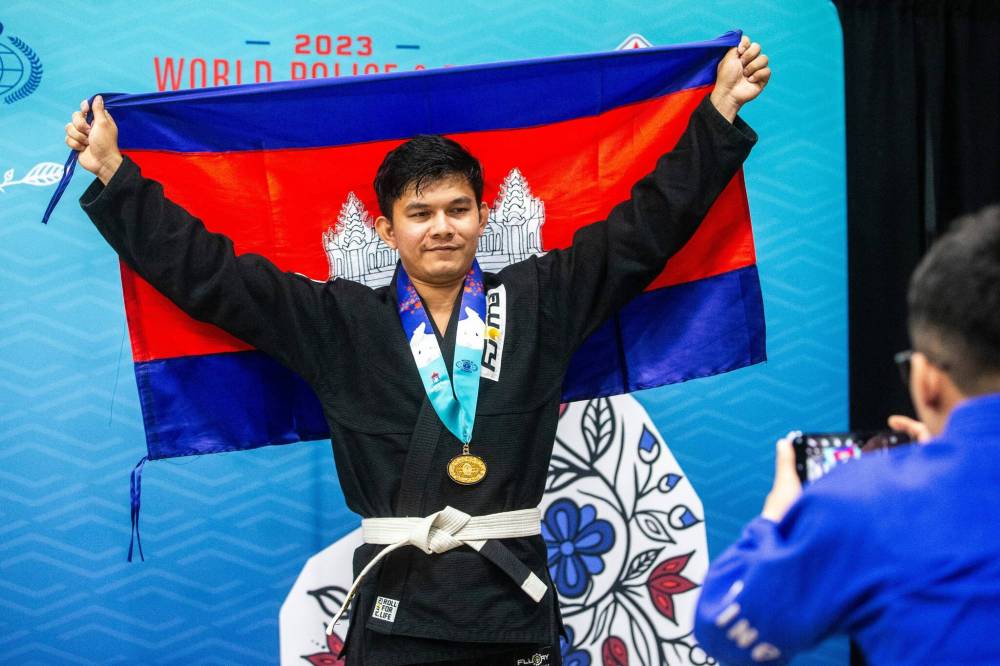 MIKAELA MACKENZIE / WINNIPEG FREE PRESS
Cambodian police jiu jitsu team member Sun Panhawat poses for a photo at the World Police and Fire Games at the RBC Convention Centre.
