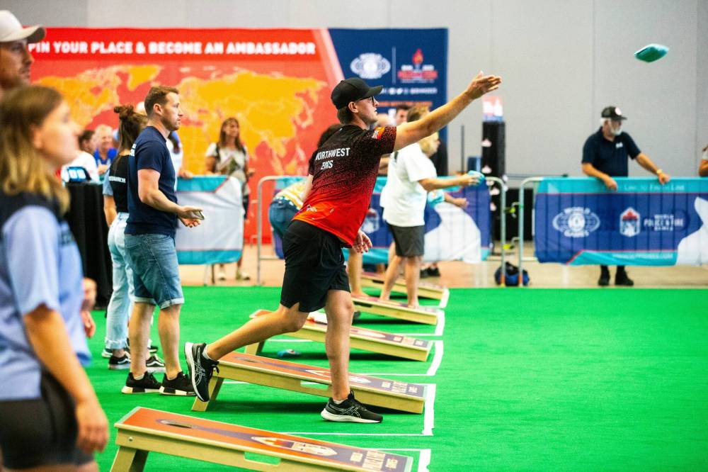 MIKAELA MACKENZIE / WINNIPEG FREE PRESS
Kyle Booth (Kenora EMS) competes in cornhole at the World Police and Fire Games at the RBC Convention Centre on Friday.
