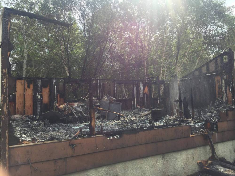 SUPPLIED
The remains of a home that was set on fire after a 31-year-old man was arrested and charged with arson, breaking and entering, and possession of a weapon for dangerous purposes.