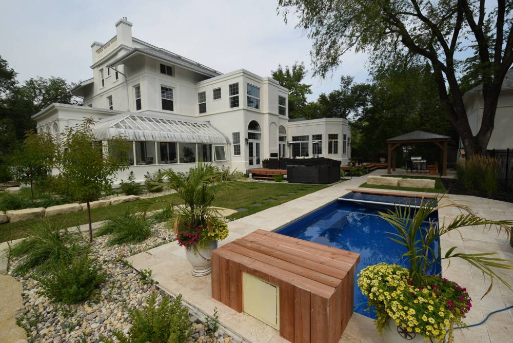 Photos by Todd Lewys / Winnipeg Free Press
The backyard features a pool, hot tub, multiple sitting areas and impeccable landscaping.
