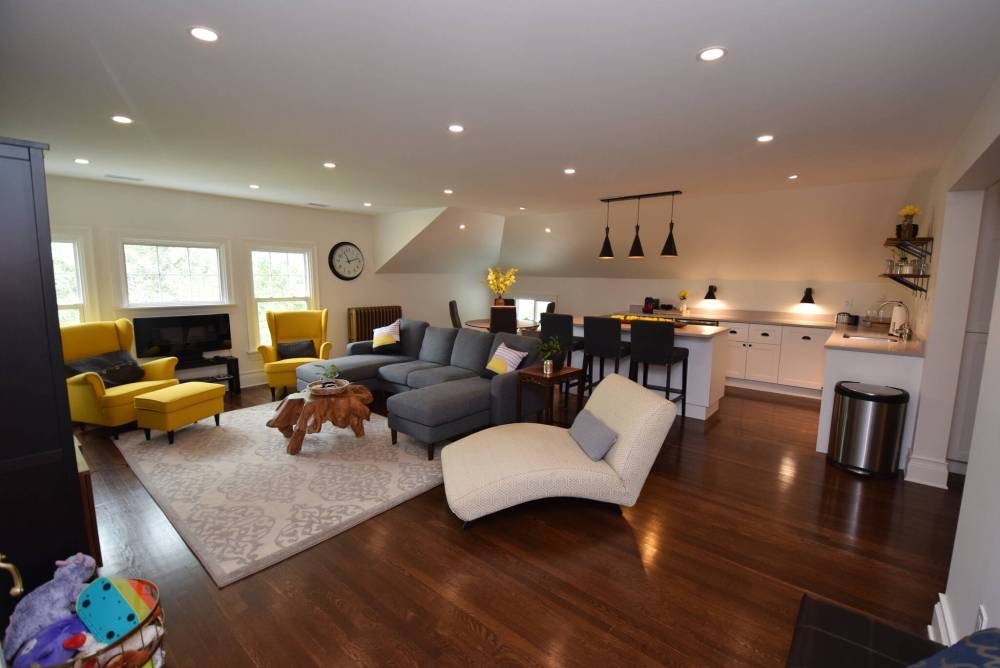 The top tier has three bedrooms, a full bath and an incredible living areaa.