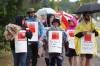 Manitoba Liquor and Lotteries employees picket along Aberdeen Avenue across from the Brandon South Liquor Mart on a rainy Thursday as part of a province-wide strike. (Tim Smith/The Brandon Sun)
