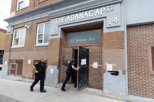 MIKE DEAL / WINNIPEG FREE PRESS
                                On Aug. 16, Winnipeg Fire Paramedic Service issued an order to vacate all suites in the Adanac Apartments at 743 - 737 Sargent Avenue by 2 p.m. Monday, after officials deemed it unfit for tenants.