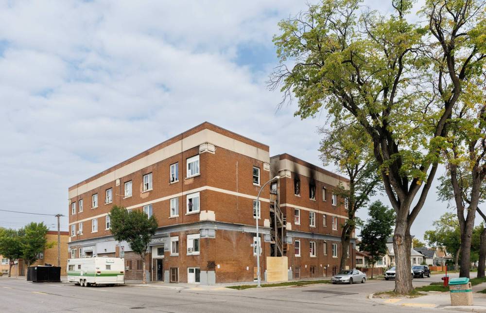 MIKE DEAL / WINNIPEG FREE PRESS
The Winnipeg Fire Paramedic Service issued an order to vacate the Adanac Apartments (737-743 Sargent Ave.) by 2 p.m. Monday, after officials identified several significant safety issues.