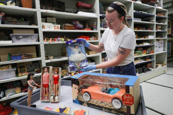 To Rylee DeJong, the Barbies reveal more than life in plastic; they're artifacts of social history. (Ruth Bonneville / Winnipeg Free Press)