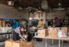 Mike Thiessen / Winnipeg Free Press
                                Staff and volunteers from the Winnipeg School Division packed and organized more than 600 food hampers Thursday for people in their school communities who need help.