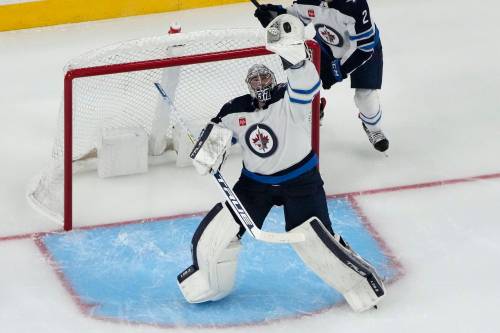 JOHN LOCHER / ASSOCIATED PRESS FILES
                                Connor Hellebuyck has been a finalist for the Vezina Trophy three times during his tenure with the Winnipeg Jets, winning it once following the 2019-20 season.
