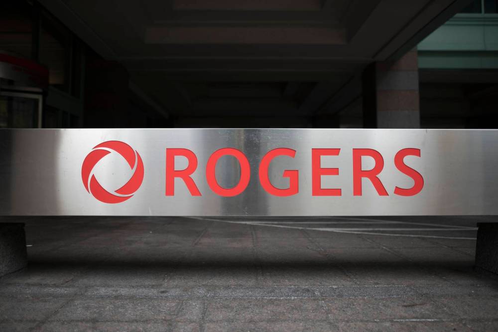 TIJANA MARTIN / THE CANADIAN PRESS FILES
Rogers Communications Inc. is being sued for more than $5 million in damages by a Winnipeg man claiming an employee trespassed and used his yard as a toilet while his children played nearby.
