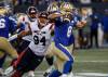 Winnipeg Blue Bombers quarterback Zach Collaros (8) is sacked by Montreal Alouettes’ Mustafa Johnson (94) during first half CFL action in Winnipeg Aug. 24. (John Woods / The Canadian Press files)