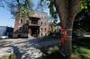 MIKE DEAL / WINNIPEG FREE PRESS
                                “We call this the ‘murder mansion,’” said Lawrence, who lives nearby, while pointing toward a three-storey apartment at 583 Furby St., where Cory Roger Roulette was shot and killed Aug. 26.