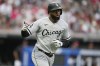 Chicago White Sox's Luis Robert Jr. gestures as he runs the bases with a home run in the third inning of a baseball game against the Cleveland Guardians, Saturday, Aug. 5, 2023, in Cleveland. (AP Photo/Sue Ogrocki)