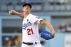 FILE - Los Angeles Dodgers starting pitcher Walker Buehler (21) throws against the Pittsburgh Pirates during the first inning of a baseball game Monday, May 30, 2022, in Los Angeles. Buehler is scheduled to throw to hitters Wednesday, Aug. 9, 2023, for the first time since he had a second Tommy John surgery two years ago. At least the Los Angeles Dodgers' pitcher has some experience throwing to someone standing in the box — Masters champion Jon Rahm, of all people.(AP Photo/John McCoy, File)