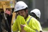 Ontario is proposing regulations to limit heat-related illnesses in workplaces amid the rise of extreme heat events across Canada. A construction worker wipes his face as he works in the heat, Friday, June 30, 2023, in Nashville, Tenn. THE CANADIAN PRESS/AP/George Walker IV