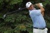 Matt Kuchar watches his tee shot on the second hole during the second round of the 3M Open golf tournament at Tournament Players Club on Friday, July 28, 2023, in Blaine, Minn. (AP Photo/Bruce Kluckhohn)