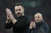 FILE - Brighton's head coach Roberto De Zerbi greets supporters after the English FA Cup semifinal soccer match between Brighton and Hove Albion and Manchester United at Wembley Stadium in London, Sunday, April 23, 2023. Ball-playing goalkeepers and hybrid defender-midfielders are in fashion in the Premier League heading into the new season. Goalkeepers are getting so good with the ball at their feet that they could almost be outfield players. (AP Photo/Kirsty Wigglesworth, File)