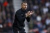 Gary O'Neil applauds in Bournemouth, England, Saturday, Nov. 12, 2022. Wolverhampton has hired Gary O’Neil as its manager in a speedy response to the departure of Julen Lopetegui just days before the start of the new Premier League season. O’Neil returns to the English top flight seven weeks after being released by Bournemouth despite defying expectations by keeping the south-coast team in the Premier League. (Steven Paston/PA via AP)