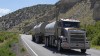 A tanker truck transports oil through the Uinta Basin basin south of Duchesne, Utah on Thursday, July 13, 2023. Local politicians and oil and gas businesses want to construct a multi-billion dollar railroad to transport more barrels out of remote eastern Utah but face safety, environmental and cost concerns. (AP Photo/Rick Bowmer)