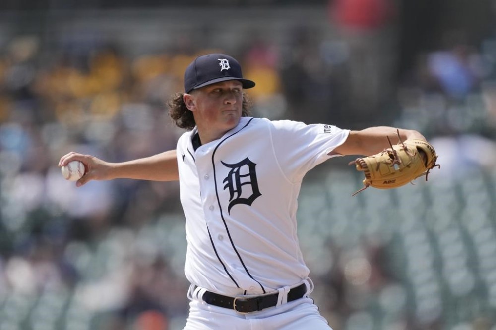 Detroit Tigers starting pitcher Reese Olson throws during the first inning of a baseball game against the Minnesota Twins, Thursday, Aug. 10, 2023, in Detroit. (AP Photo/Carlos Osorio)