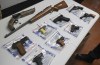 FILE - A collection of illegal guns is displayed during a gun buyback event, May 22, 2021, in Brooklyn, N.Y. In the latest legal upheaval since a major Supreme Court ruling on gun rights, a federal appeals court has ruled against a law that bans drug unlawful users from having guns. The opinion handed down Wednesday, Aug. 10, 2023, overturned the conviction of a Mississippi man, finding past drug use shouldn't automatically ban people from possessing guns. (AP Photo/Bebeto Matthews, File)