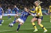 Japan's Risa Shimizu kicks the ball clear of Sweden's Stina Blackstenius, right, during the Women's World Cup quarterfinal soccer match between Japan and Sweden at Eden Park in Auckland, New Zealand, Friday, Aug. 11, 2023. (AP Photo/Andrew Cornaga)