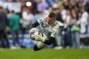 FILE - Real Madrid's goalkeeper Andriy Lunin warms up prior La Liga soccer match between Real Madrid and FC Barcelona in Madrid, Spain, Oct. 16, 2022. Real Madrid coach Carlo Ancelotti says that his starting goalkeeper heading into the new season will be the little used Andriy Lunin even if the club signs a new player following the serious injury to Thibaut Courtois. (AP Photo/Bernat Armangue, File)