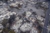 Wildfire wreckage is seen Thursday, Aug. 10, 2023, in Lahaina, Hawaii. Canadians returning from Maui have told of harrowing scenes before their escape from the fire-devastated Hawaiian island. THE CANADIAN PRESS/AP/Rick Bowmer