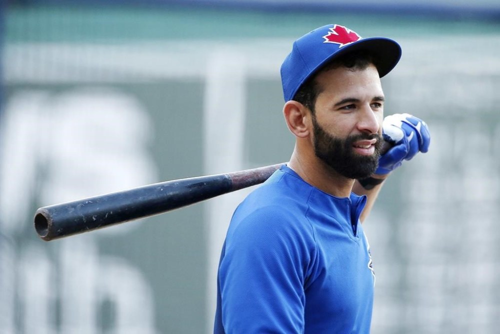 FILE - Toronto Blue Jays' Jose Bautista warms up before a baseball game against the Boston Red Sox in Boston, Tuesday, Sept. 26, 2017. Former big league slugger José Bautista is signing a one-day contract so he can retire with the Toronto Blue Jays. The Blue Jays announced the deal on Friday, Aug. 11, 2023. (AP Photo/Michael Dwyer, File)