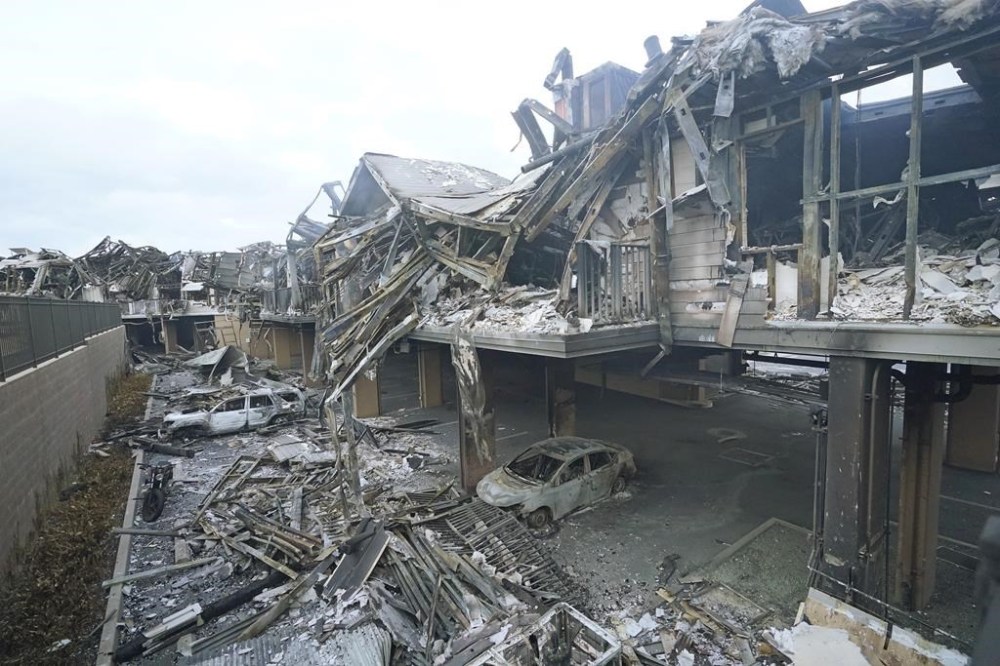 Wildfire wreckage is shown Friday, Aug. 11, 2023, in Lahaina, Hawaii. Hawaii emergency management records show no indication that warning sirens sounded before people ran for their lives from wildfires on Maui that wiped out a historic town. (AP Photo/Rick Bowmer)