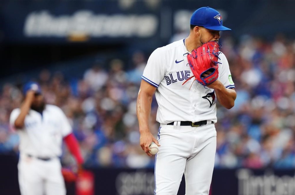 Toronto Blue Jays starting pitcher Jose Berrios (17) reacts on the mound against the Toronto Blue Jays during first inning interleague MLB baseball action in Toronto on Friday, August 11, 2023. THE CANADIAN PRESS/Chris Young