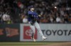 Texas Rangers third baseman Josh Smith throws out San Francisco Giants' Michael Conforto at first during the fifth inning of a baseball game Friday, Aug. 11, 2023, in San Francisco. (AP Photo/Godofredo A. Vásquez)