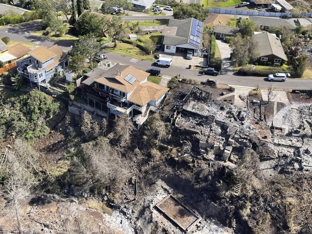 This photo provided by the Hawaii Department of Land and Natural Resources shows burnt areas in the Kula community of the Upcountry region on the Maui island, Hawaii, Friday, Aug. 11, 2023, following a wildfire. (Hawaii Department of Land and Natural Resources via AP)