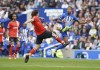 Luton Town's Tom Lockyer and Brighton and Hove Albion's Joao Pedro, right, battle for the ball during the English Premier League soccer match between Brighton and Hove Albion and Luton Town at the AMEX Stadium in Brighton, England, Saturday Aug. 12, 2023. (Gareth Fuller/PA via AP)